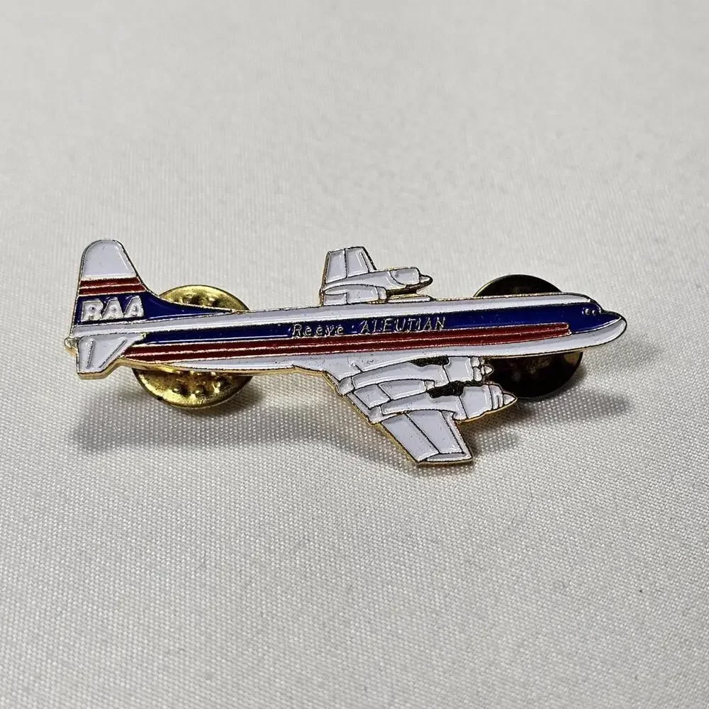 Reeve Aleutian Airways (RAA) Lockheed L-188 Electra Turboprop Airliner Lapel Pin - Picture 1 of 3
